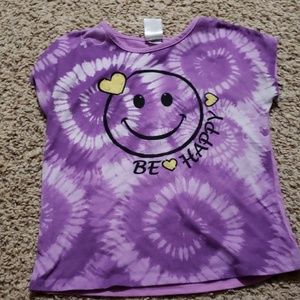 Purple pajama shirt and purple shorts with emojis